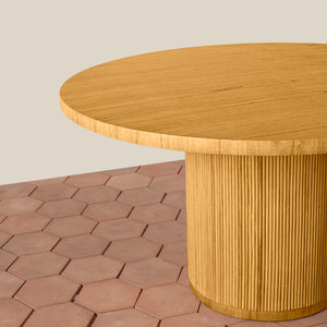 Wooden round table on a hexagonal patterned floor with a neutral background - Number 5