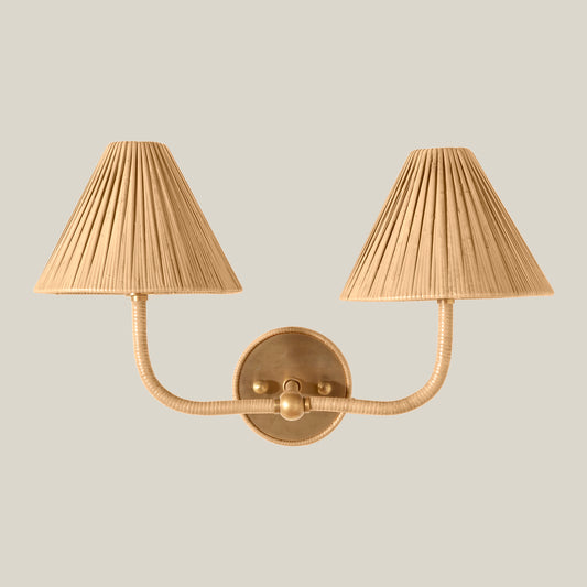 Gold wall sconce with pleated lampshades on a beige background - Image 2