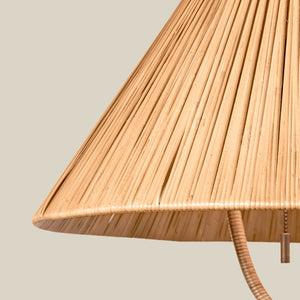 Closeup of a rattan lampshade against a neutral background - Number 4