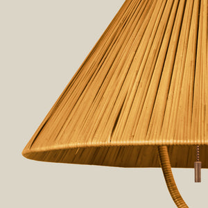 Close-up of a woven lampshade with a beige background - Number 2