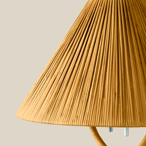 Close-up of a textured yellow lampshade on a neutral background - Number 3