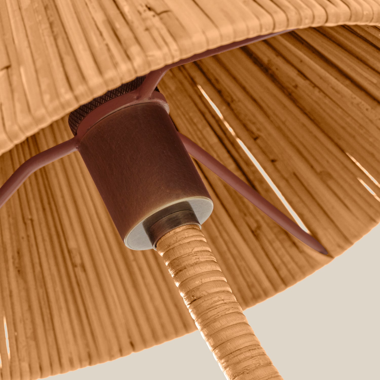 Rattan sconce with brass accents against a neutral background- Number 4