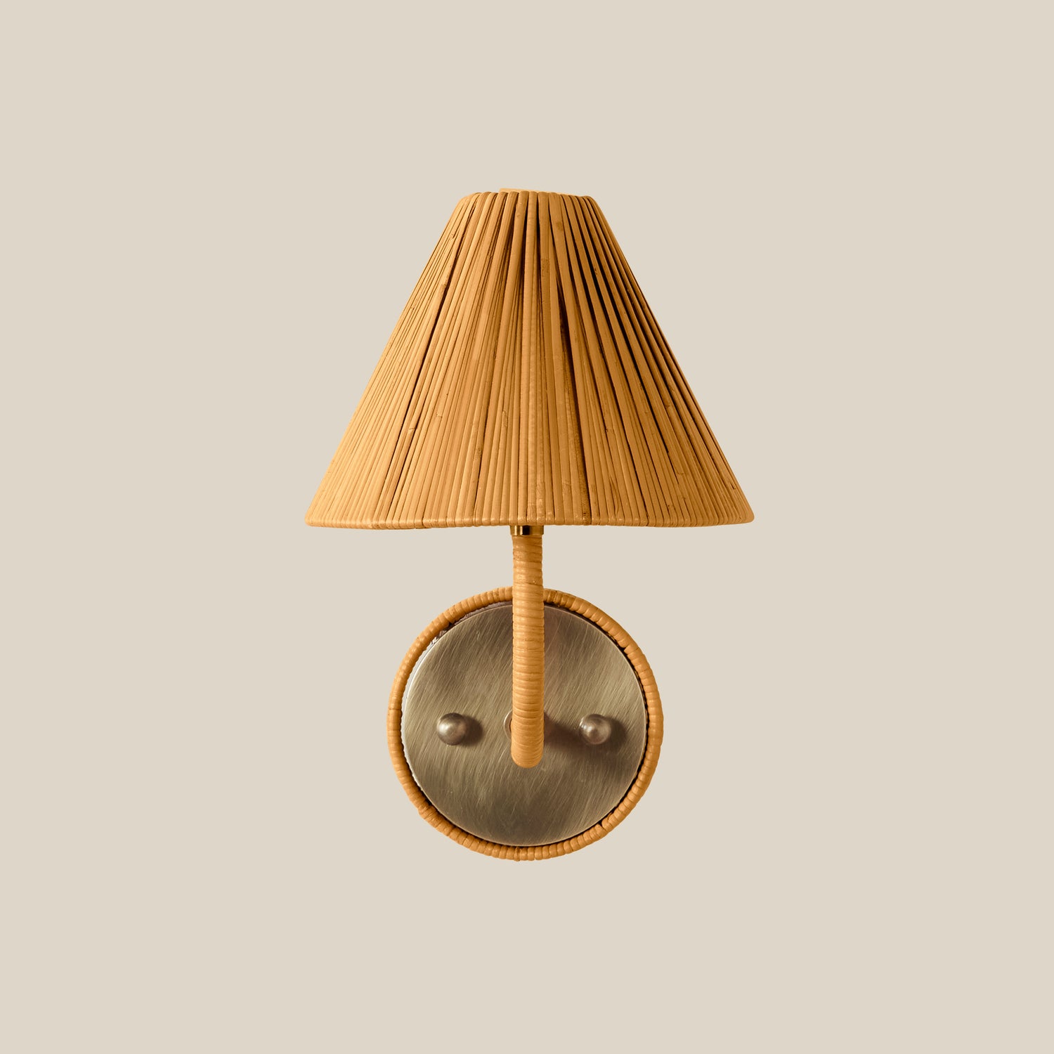 Wall-mounted lamp with pleated shade and metallic base on a beige background- Number 1