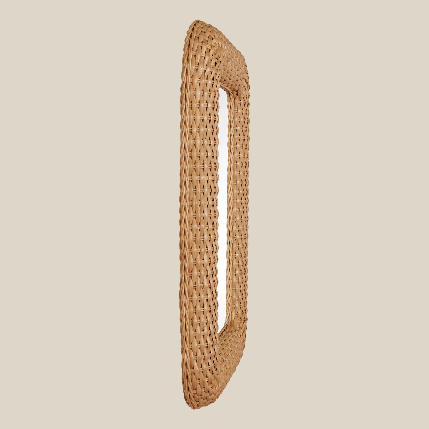Woven rattan mirror on a beige background- Number 4