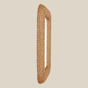 Woven rattan mirror on a beige background - Number 4