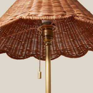 Wicker lampshade with brass fixture on a beige background - Number 4