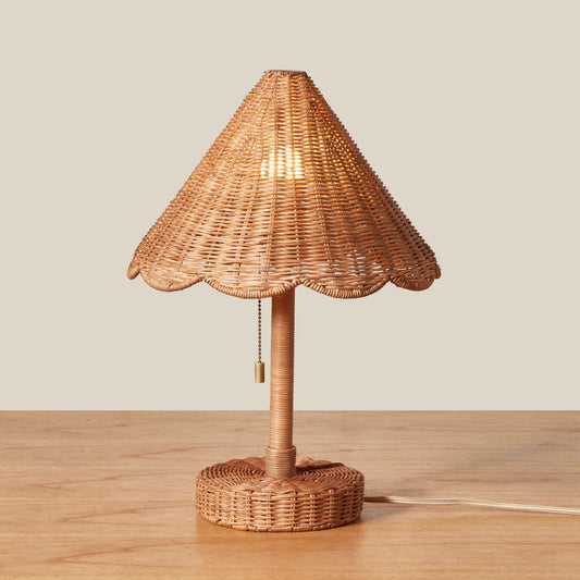 Wicker table lamp with scalloped shade on a wooden surface - Image 2