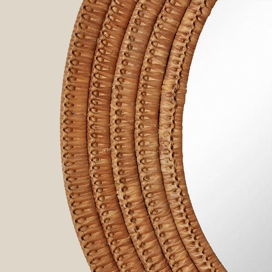 Close-up of a textured brown mirror on a light beige background - Image 2