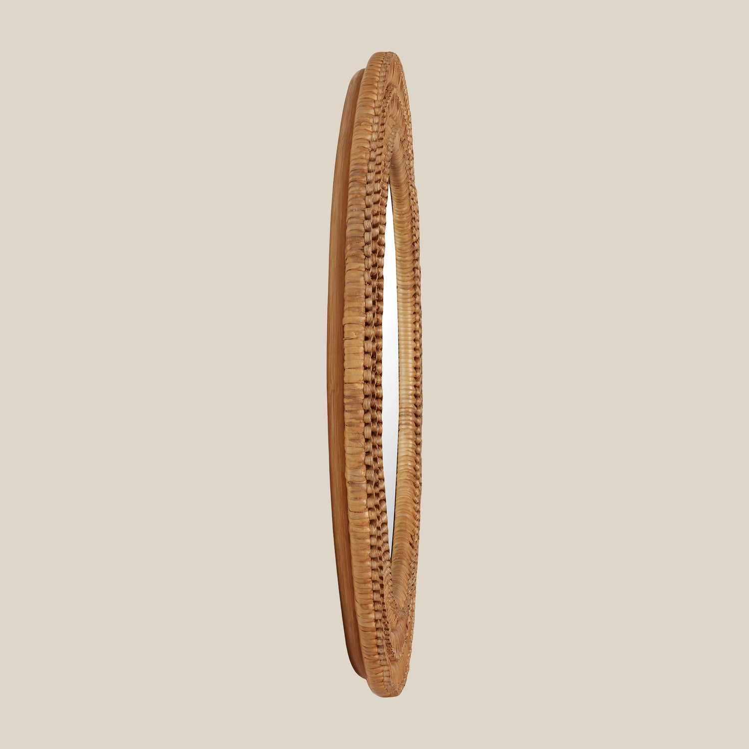 Woven mirror on a beige background- Number 3