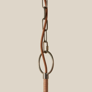 Close-up of a metal chain with a beige background - Number 4