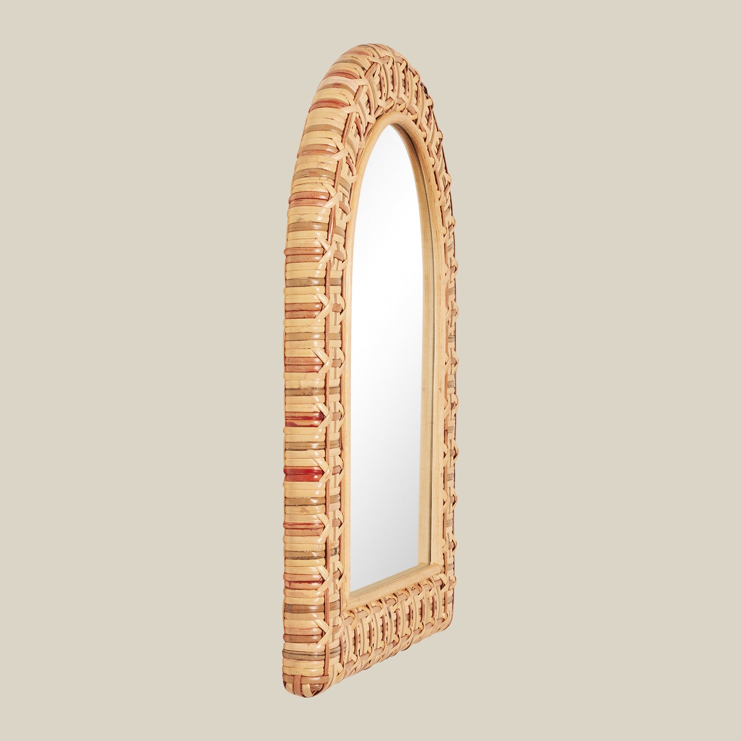 Decorative mirror with a wicker frame on a beige background- Number 4