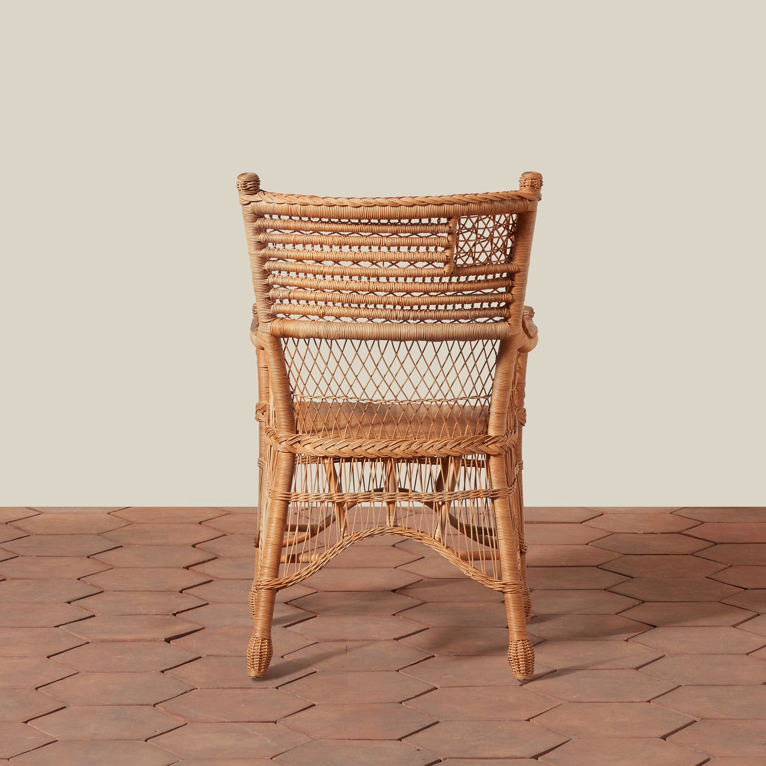 Wicker chair on a wooden floor with a neutral background- Number 4