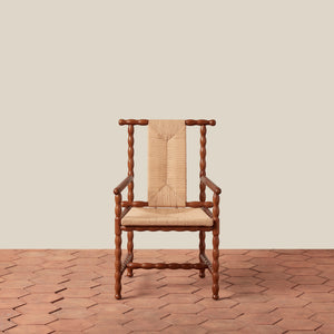 wooden arm chair on tile floor against beige background - Number 3