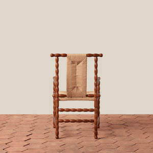 wooden arm chair on tile floor against beige background - Number 4