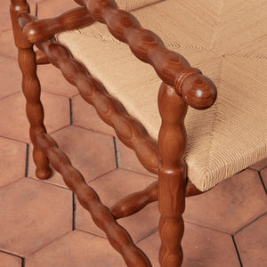 wooden arm chair on tile floor against beige background - Number 5
