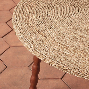 Round woven mat on a wooden floor - Number 4