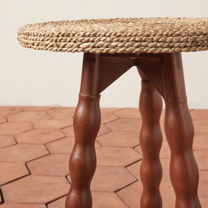 wood stool on tile floor against beige wall - Number 3
