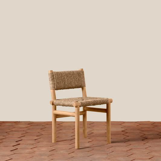 brown chair on brick floor