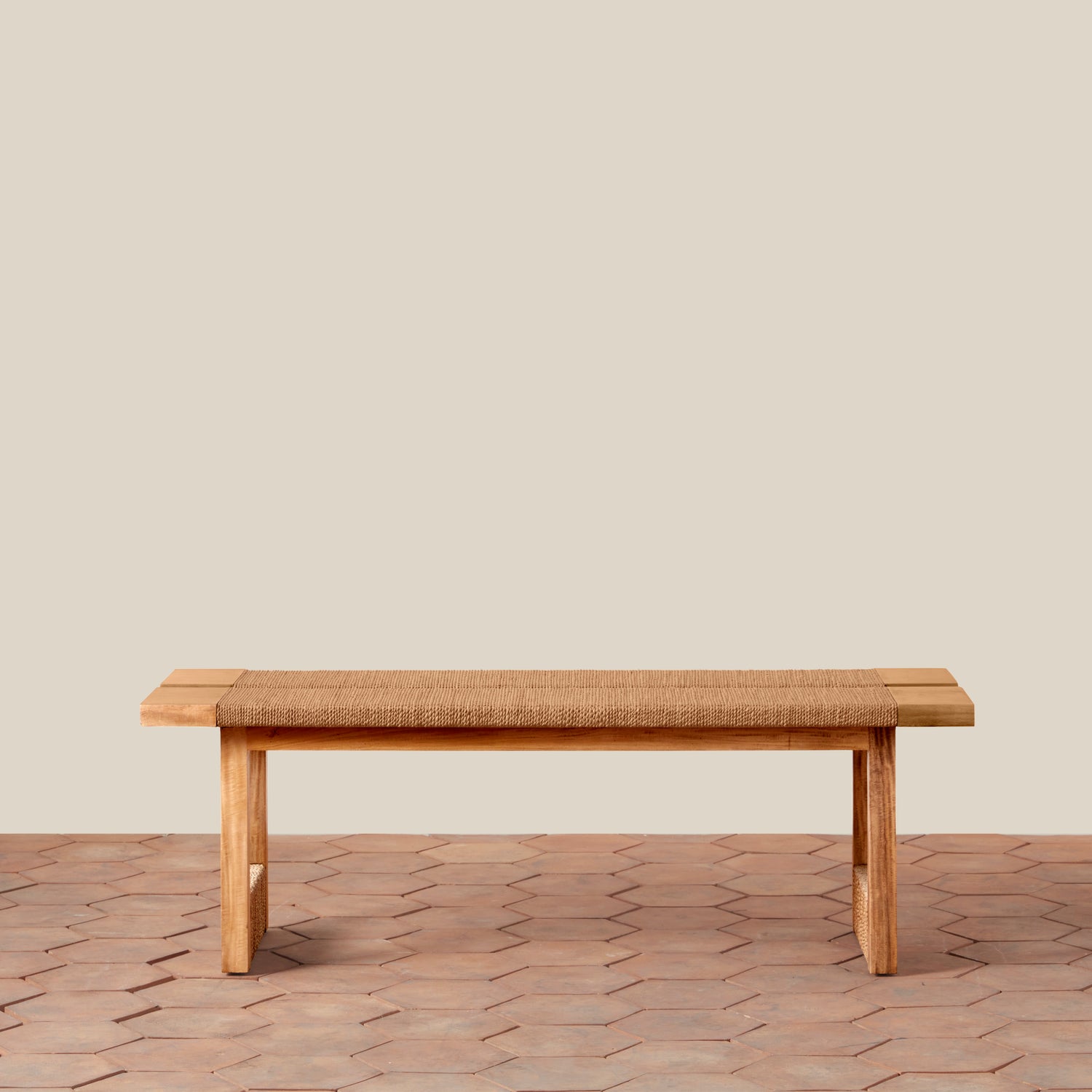 Wooden bench on a wooden floor with a beige wall background- Number 4