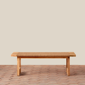 Wooden bench on a wooden floor with a beige wall background - Number 4