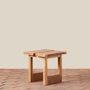 Wooden stool with woven seat and backrest on a wooden floor. - Number 1