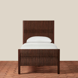 Wooden bed frame with white mattress and pillow on a beige background - Number 8