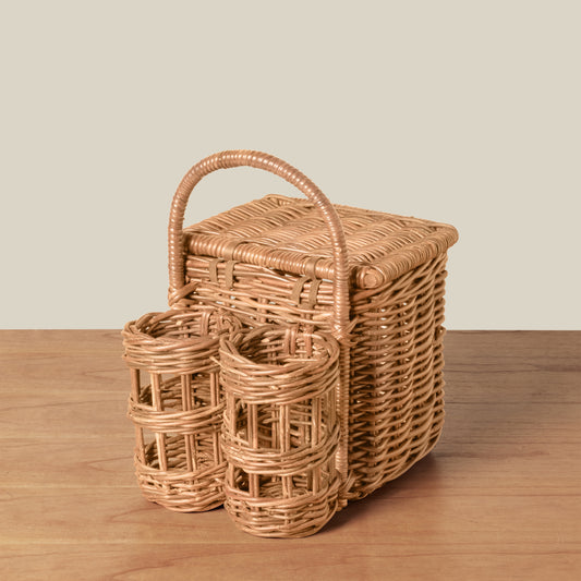 wine and cheese picnic basket on table