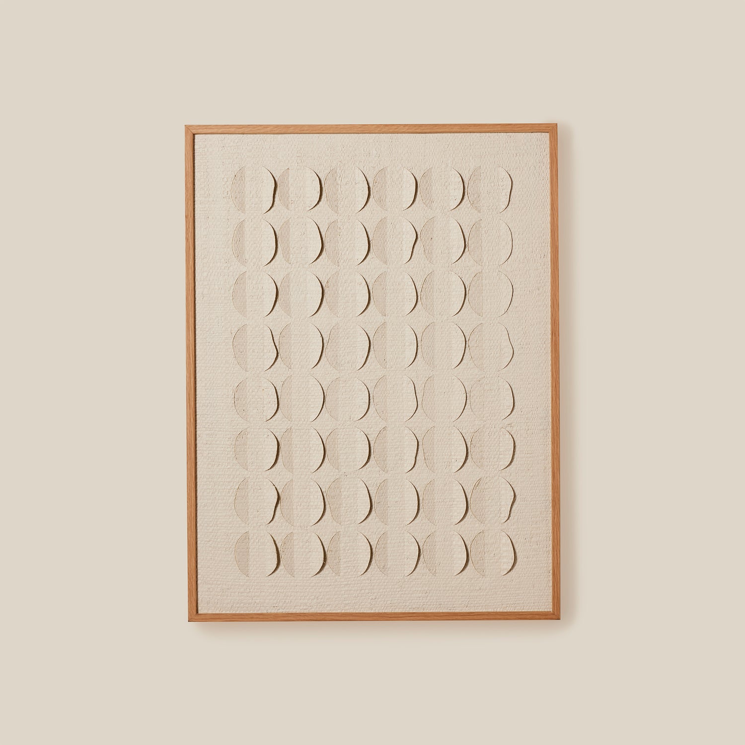 Framed artwork with geometric pattern on a beige wall- Number 1