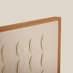 Textured wall panel with wooden frame on a beige background - Number 4