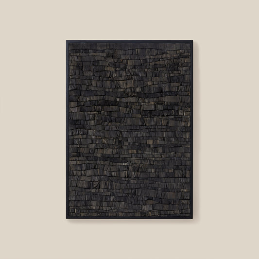 Rectangular dark gray rug on a beige background