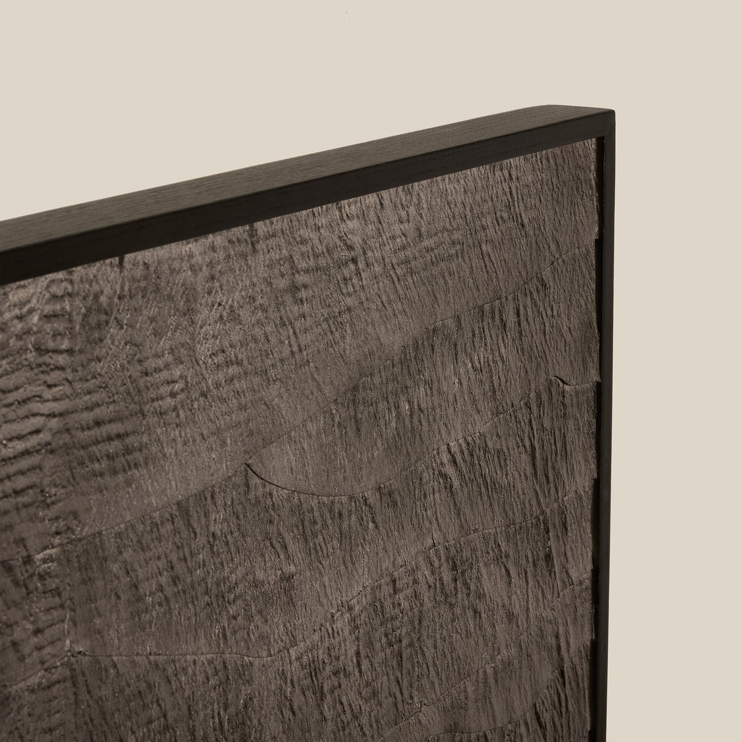 Textured dark wood panel with a black frame on a beige background- Number 4