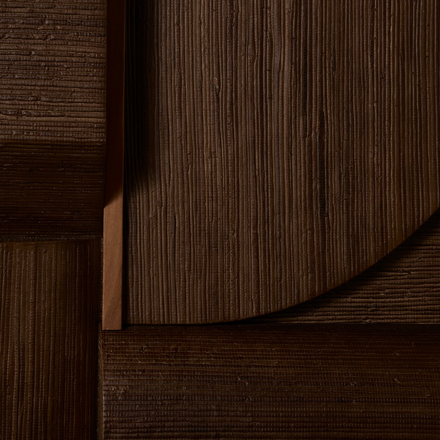 Close-up of dark brown wooden panel with a visible grain pattern- Number 5