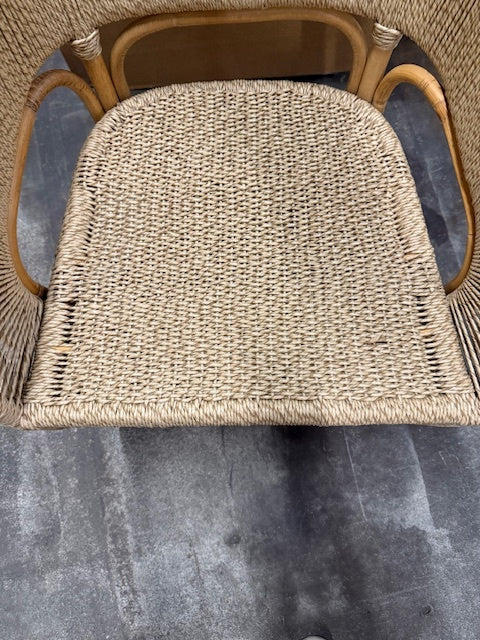 Wicker chair seat on a gray surface- Number 3