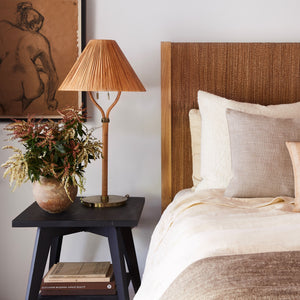 delphine table lamp next to bed