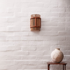 noa sconce hanging on wall