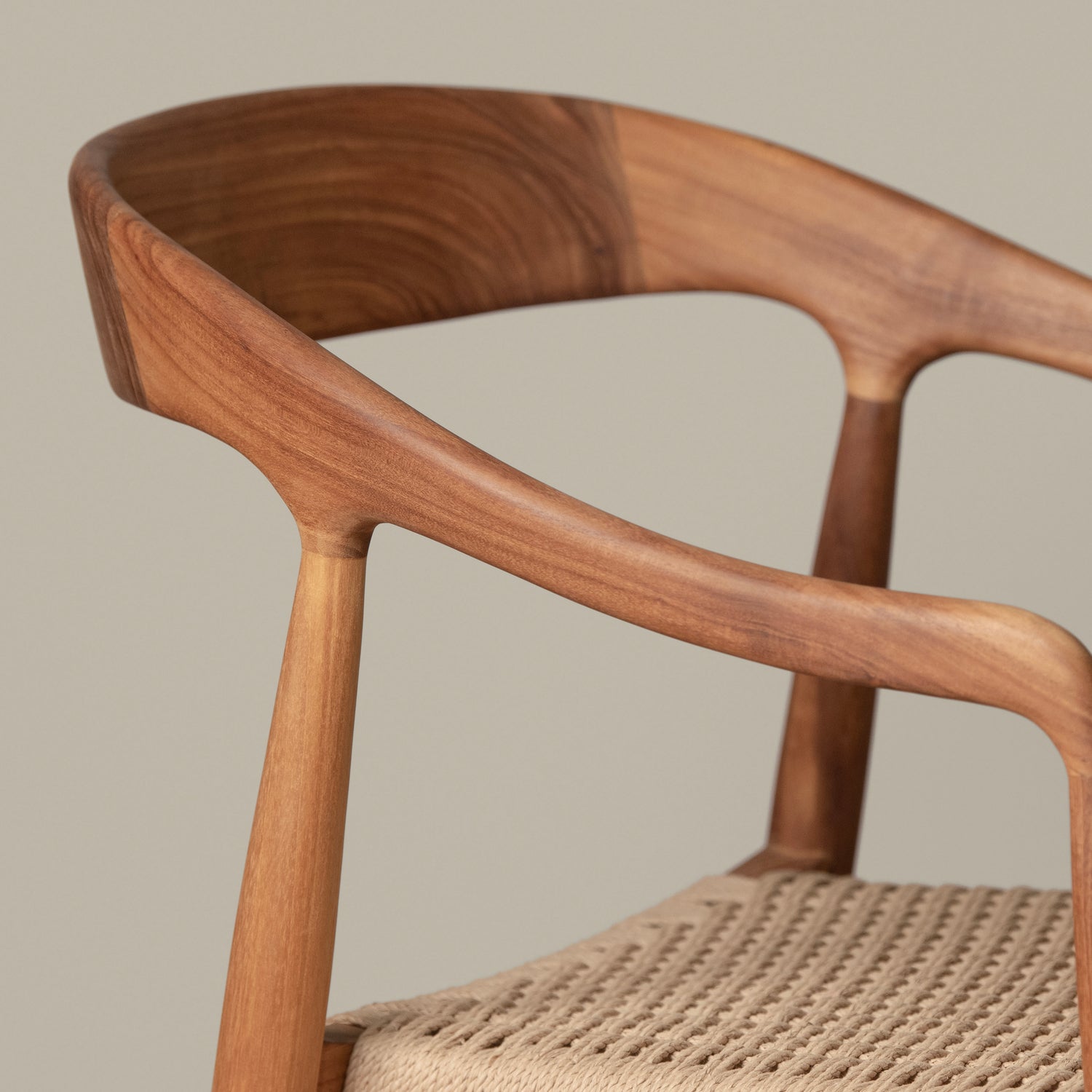 ingrid woven arm chair in teak detail