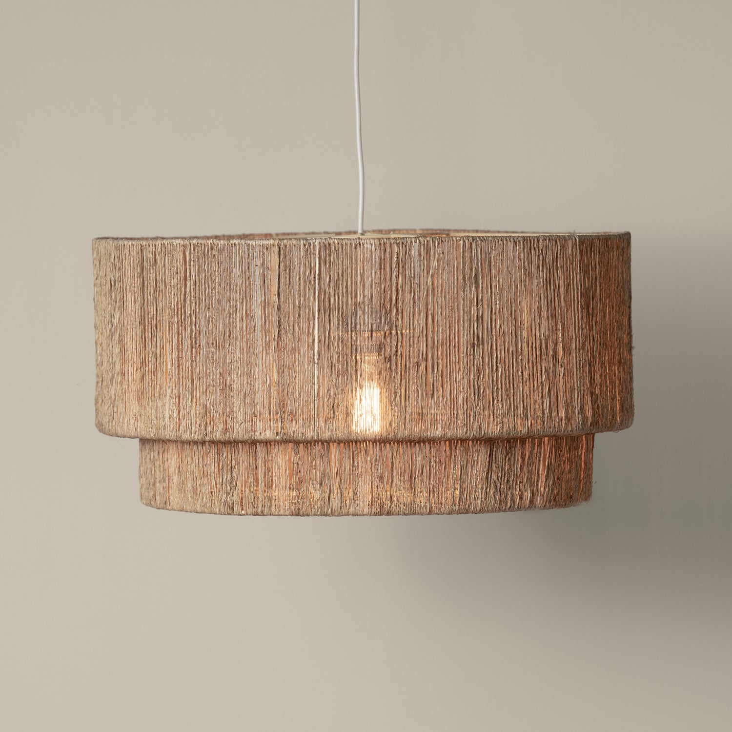 cocktail 2 tier jute pendant with light on