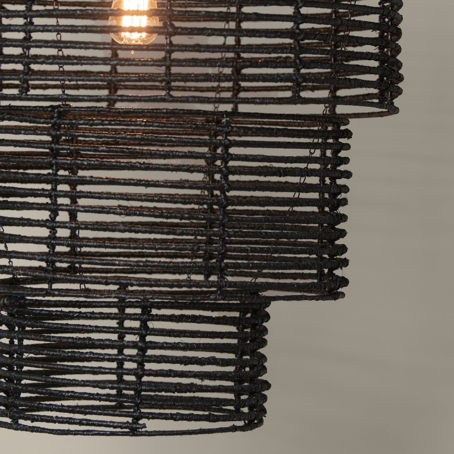 3 tier chandelier in black detail with light on