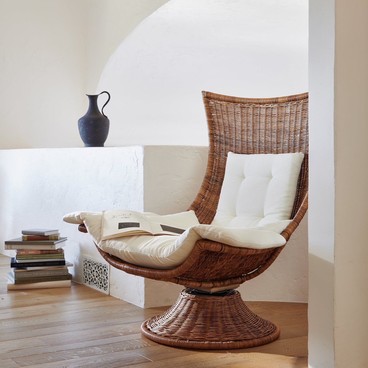healdsburg wicker swivel chair with cushion in living room