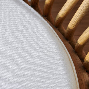 coste rattan lounge chair linen cushion detail