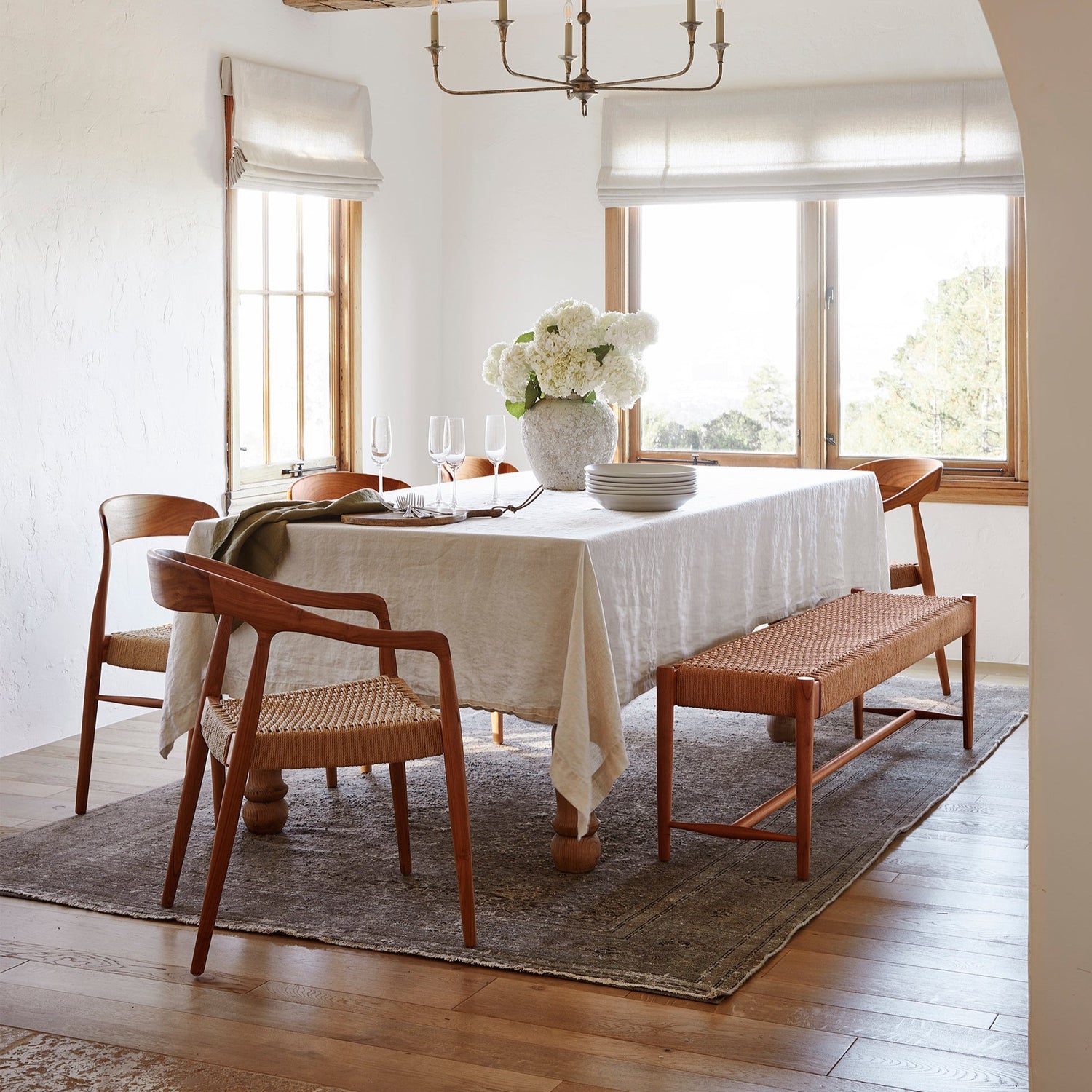 ingrid woven side chairs at dining table